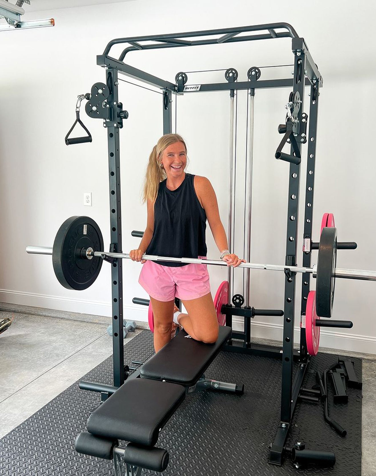 RitFit home gym showcase – customer working out with strength training equipment