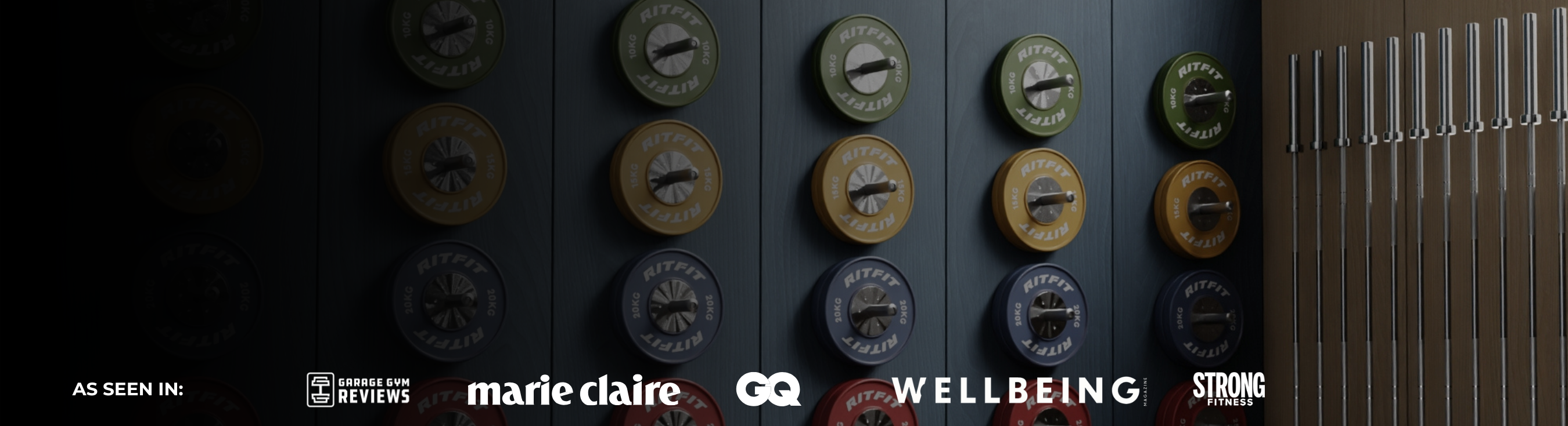 Collection of hair styling tools with visible brand logos on a dark background