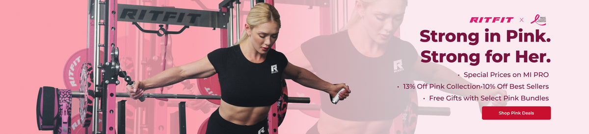 Woman performing lateral raise with RitFit barbell in pink home gym setting