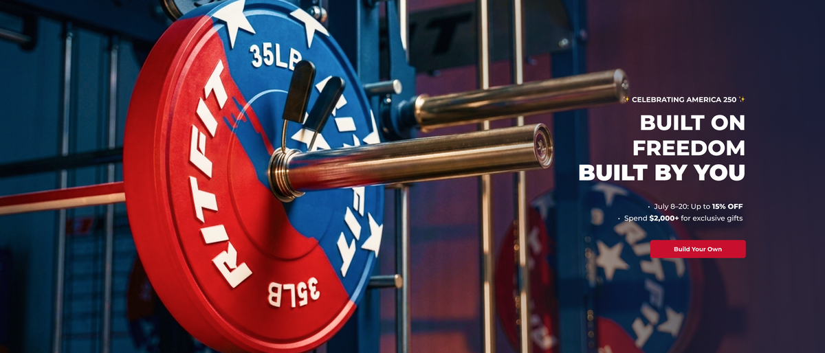 Red white and blue TIT FIT 35lb weight plates on a barbell rack