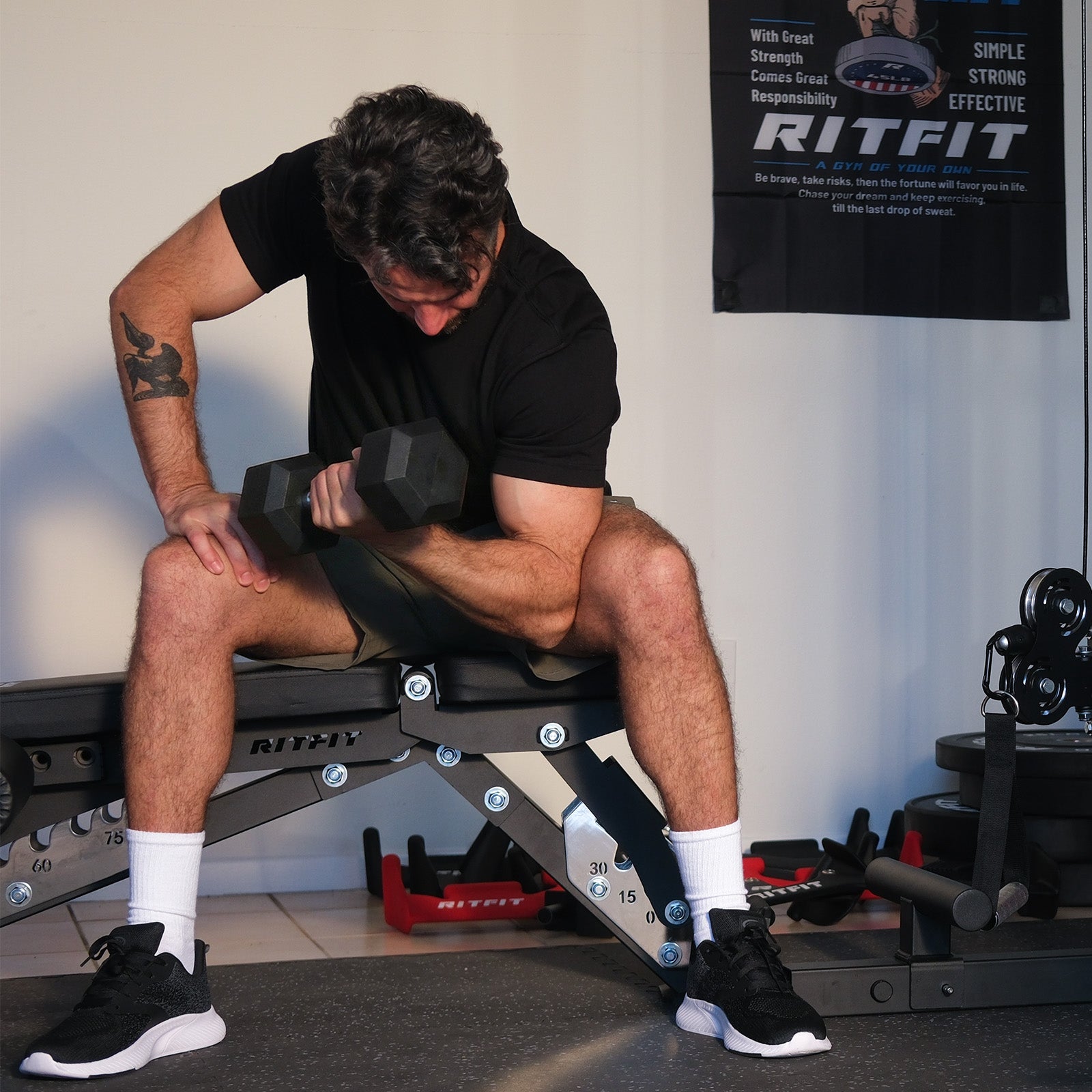 Man exercising with dumbbells in a gym setting, with 'RITFIT' branding visible.