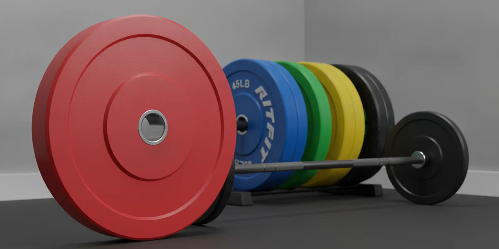 Red 25 kg olympic weight plate with colour coded calibrated plates and a barbell