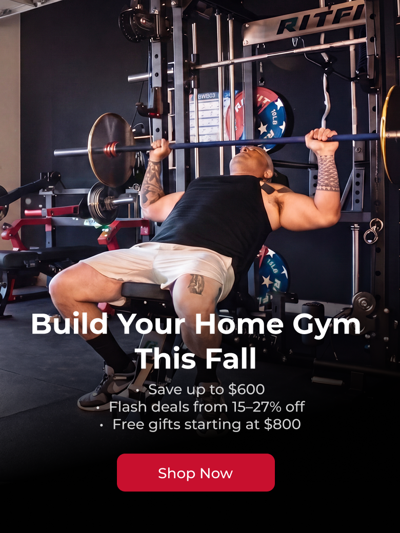 Man bench pressing barbell on Ritfit power rack for home gym