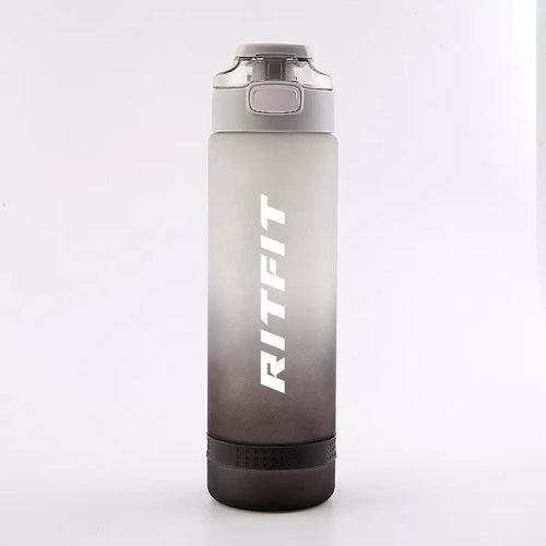 RitFit water bottle in black with a clear body and blue lid, designed for fitness and outdoor use.