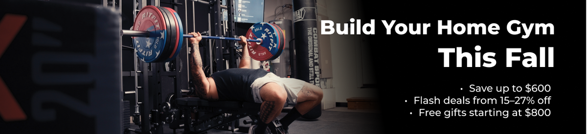 Man performing bench press with barbell in home gym setting