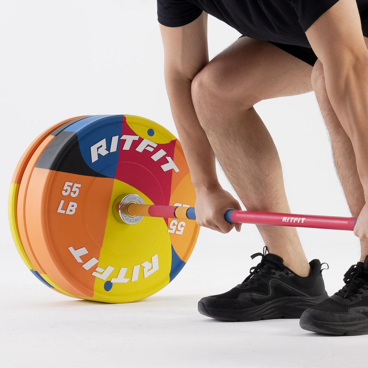 RitFit Memphis bumper plates for home gym, set of three durable weight plates with black finish and clear weight markings.