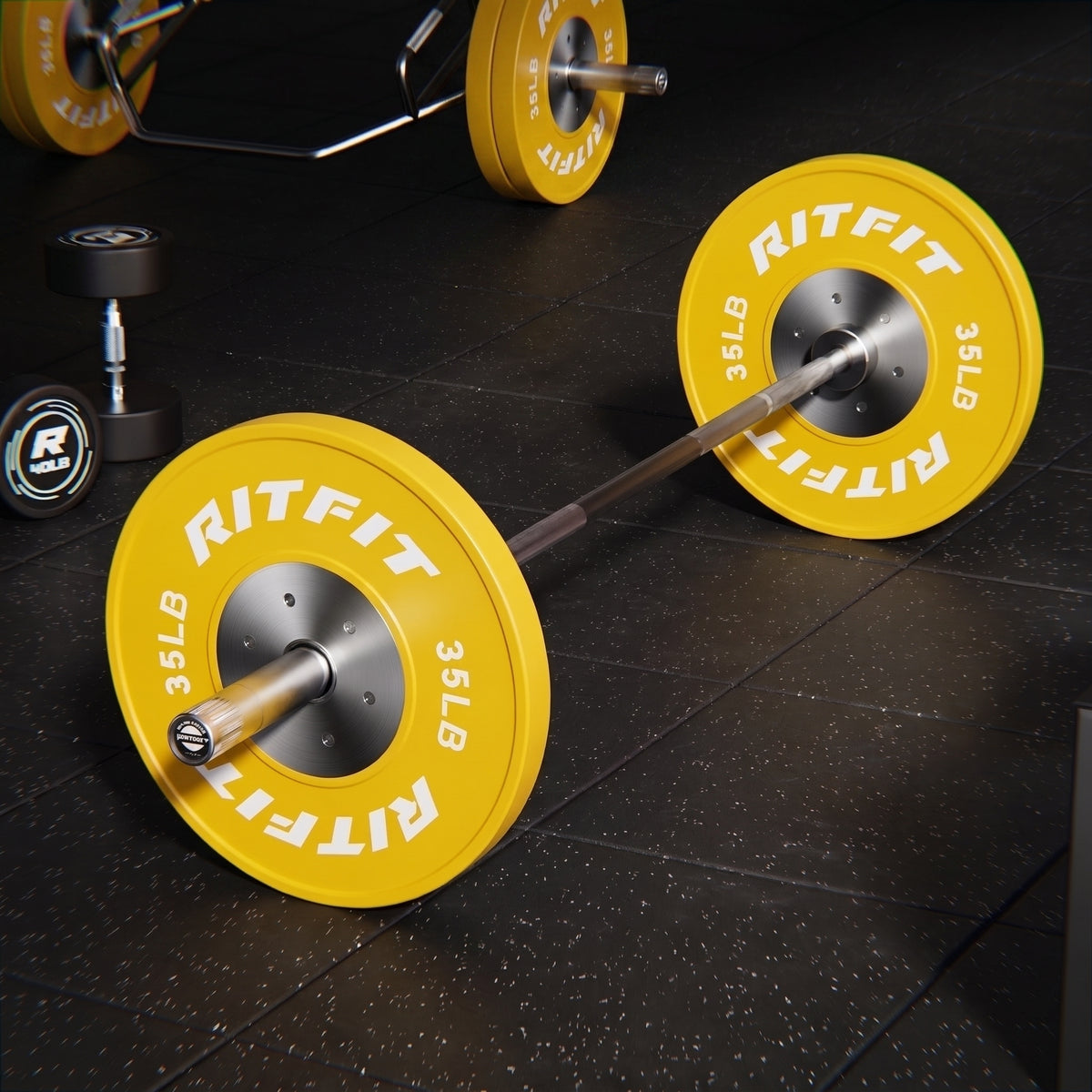 Yellow RitFit 35LB bumper plates on barbell resting on black gym floor
