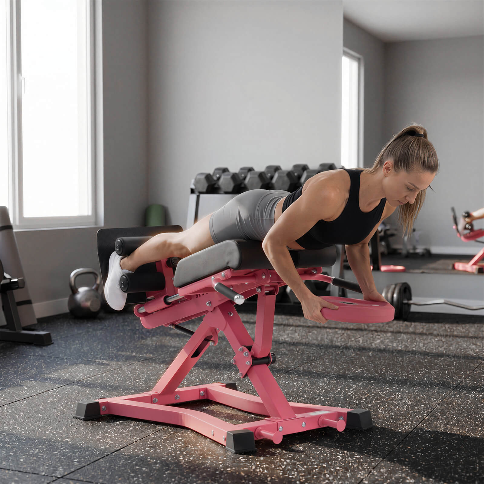 Pink RitFit BE01 adjustable back extension machine for strength training, designed for home and gym use.