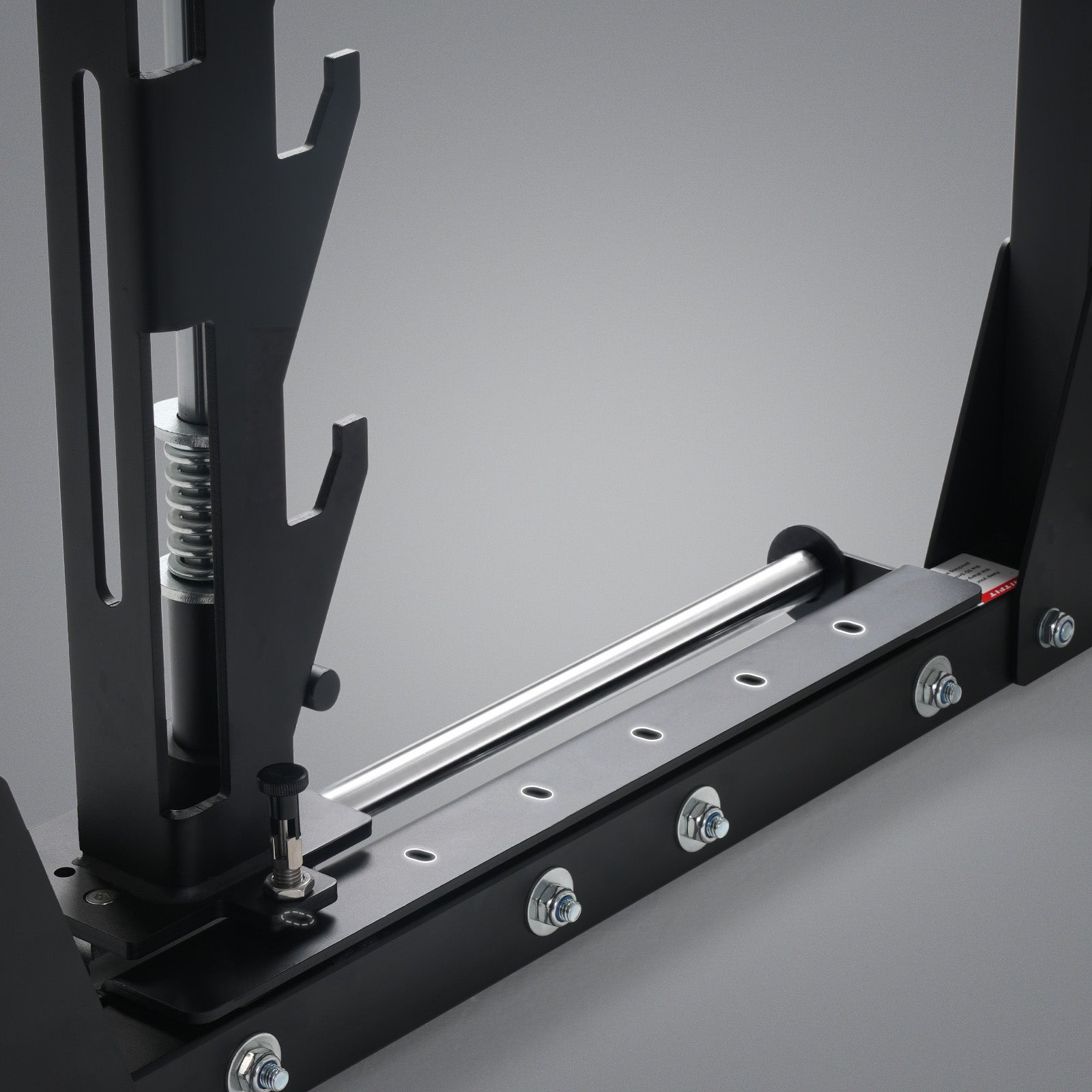 Black RitFit P9 power cage base with silver Smith machine rail and adjustment holes