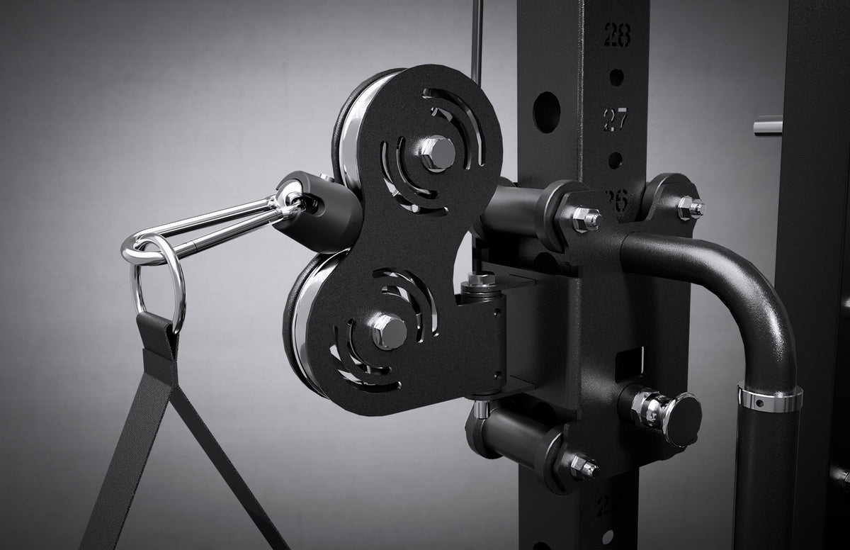 Black dual pulley attachment mounted on power rack with carabiner and strap for cable exercises