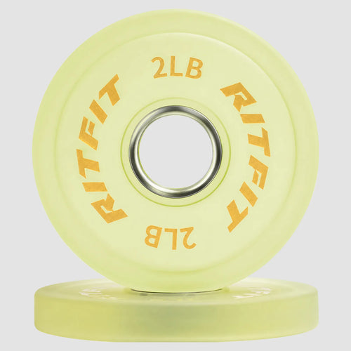 Translucent yellowRitFit Crystal Plate with orange 2LB text and metal center ring