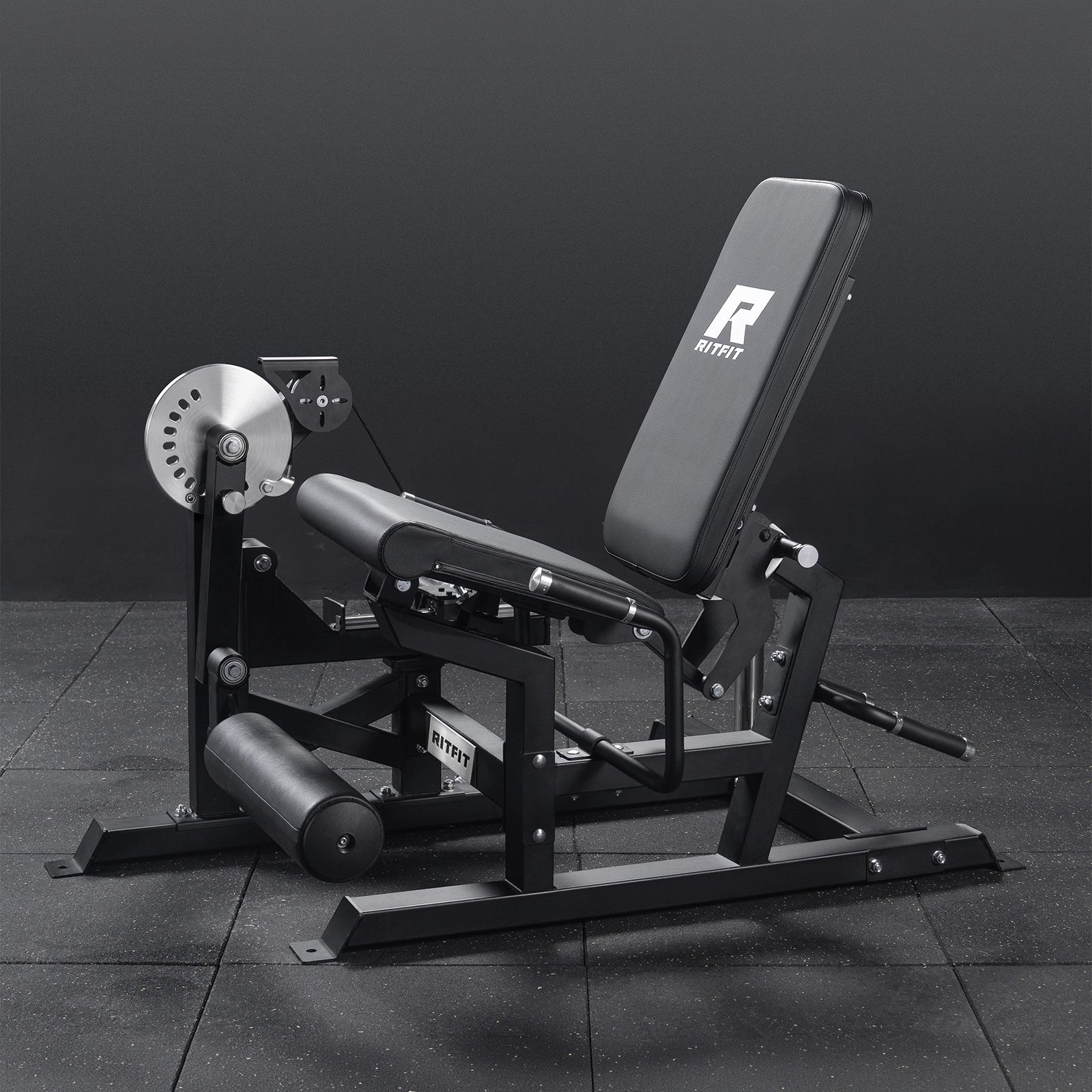 RitFit Mustang PRO Leg Extension Curl Machine for strength training, showing the adjustable padded leg support and frame.
