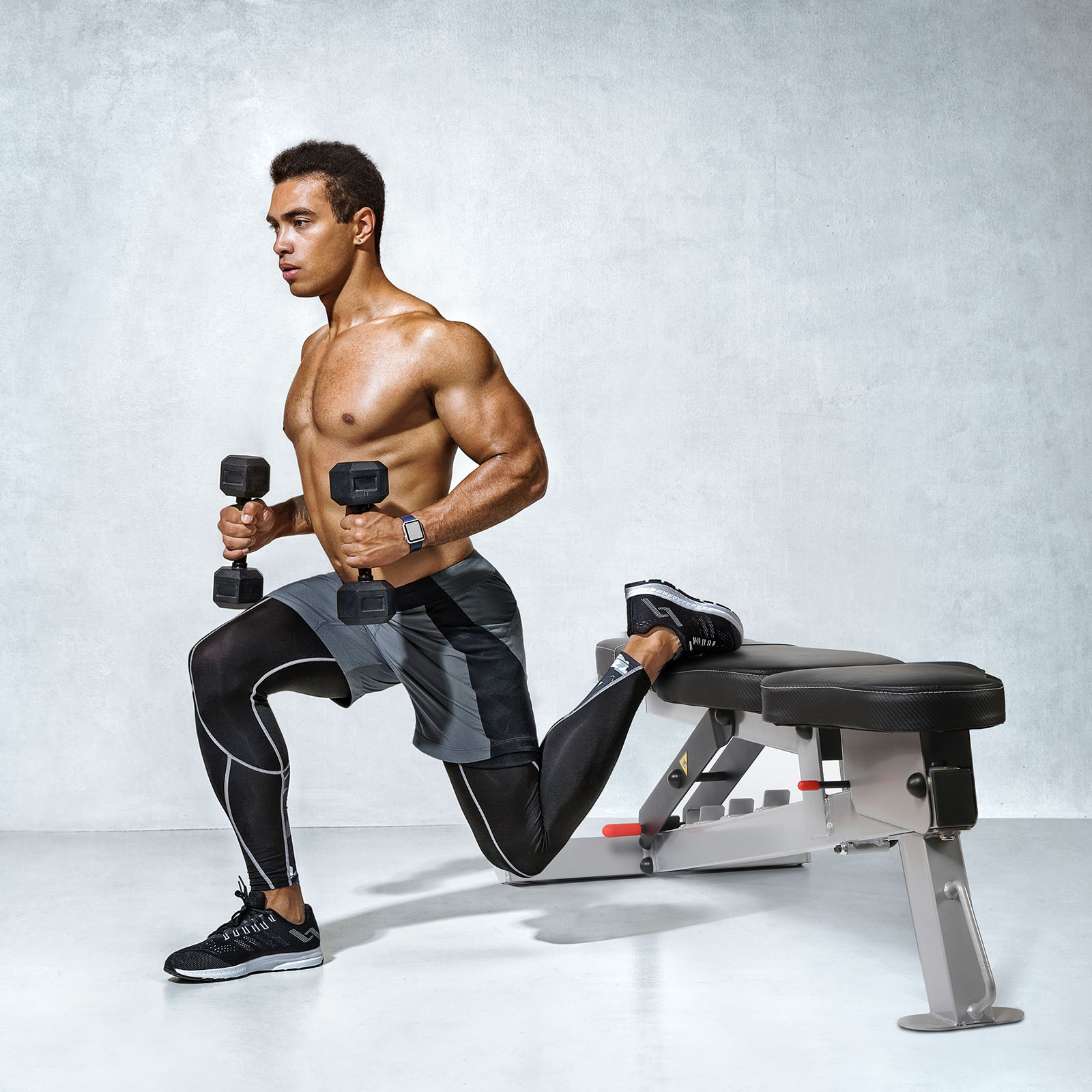 Man Workout with Adjustable Bench and Dumbbell